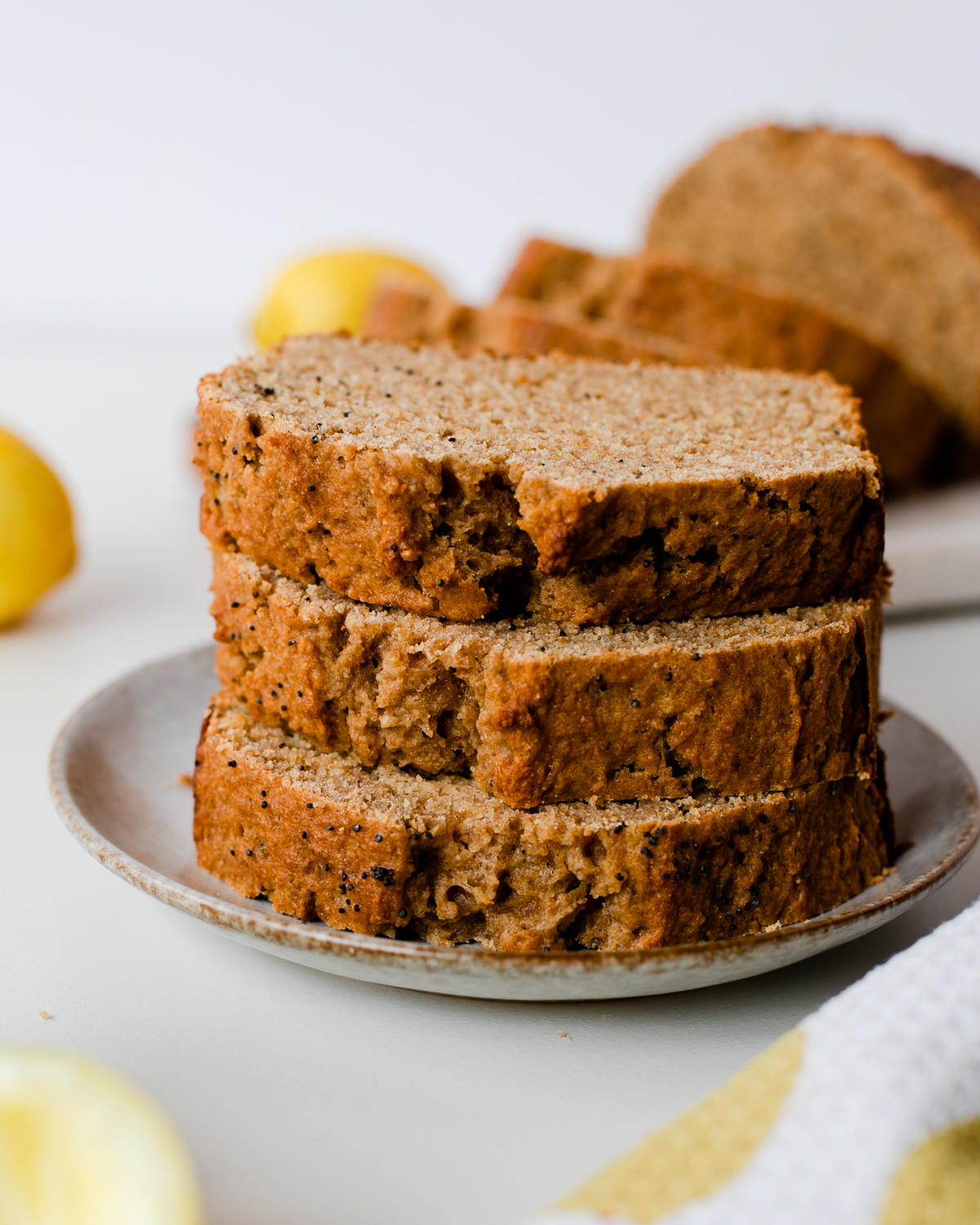 Slices of stacked whole wheat lemon poppy seed bread - close up shot