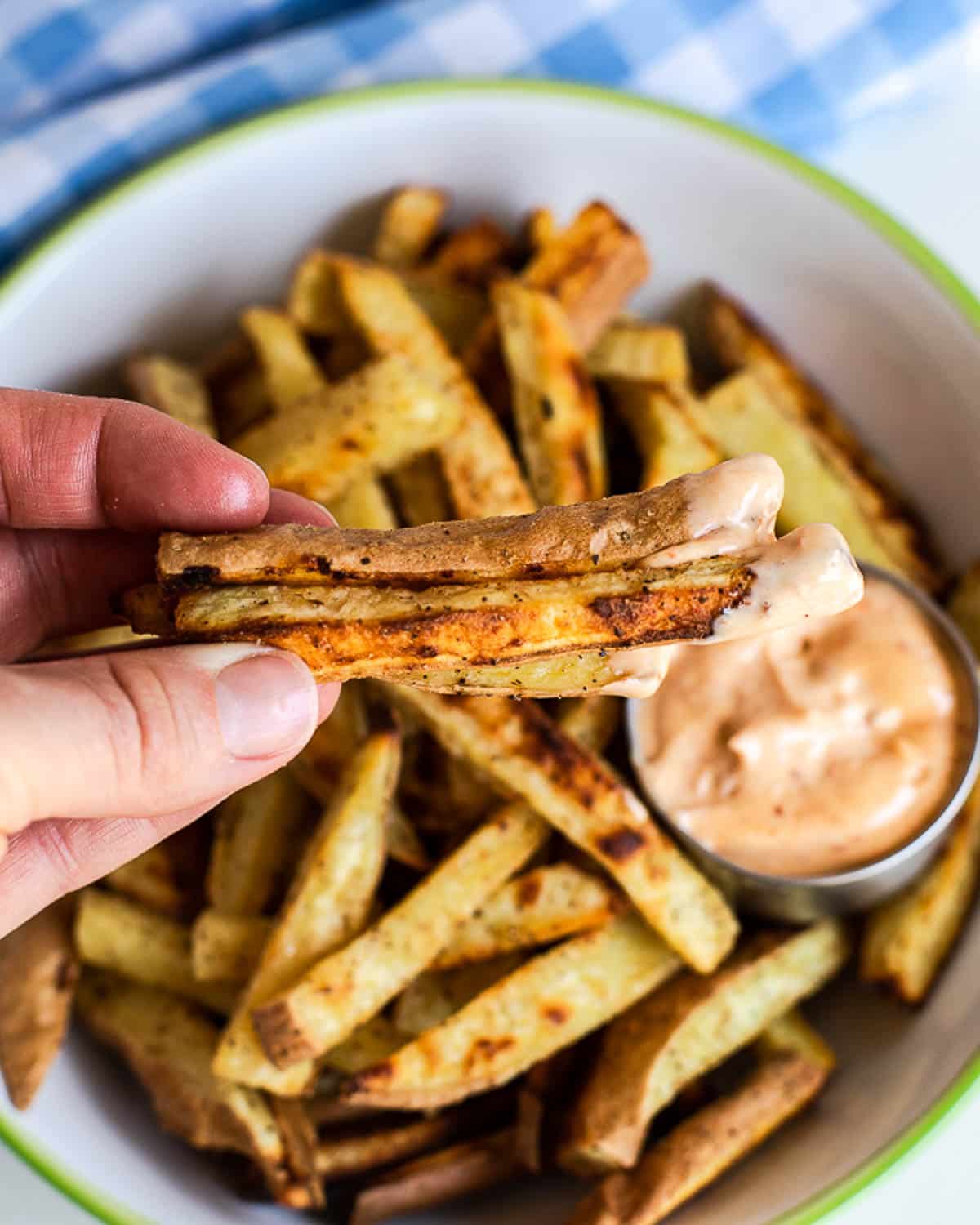 crispy white sweet potato fries dipped in chipotle mayo