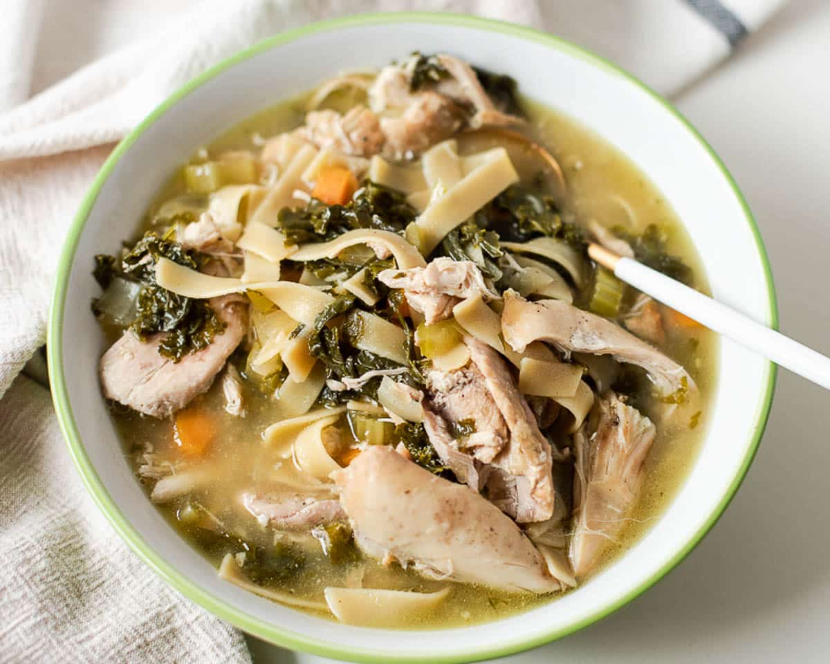 the best Crockpot Chicken and Noodle Kale Soup