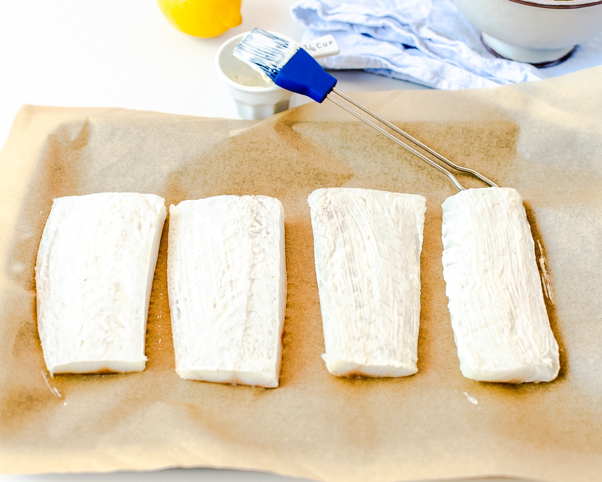 preparing cod to bake