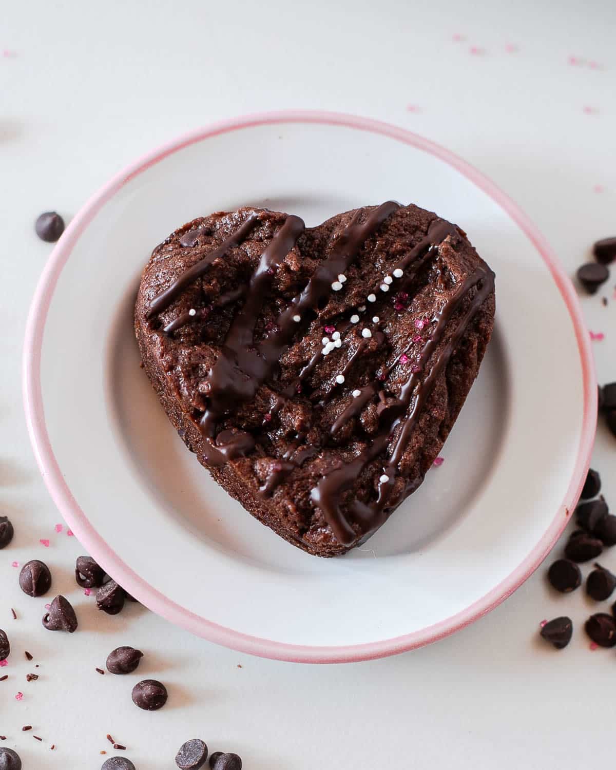 overhead of one of the heart shaped brownies on a plate.