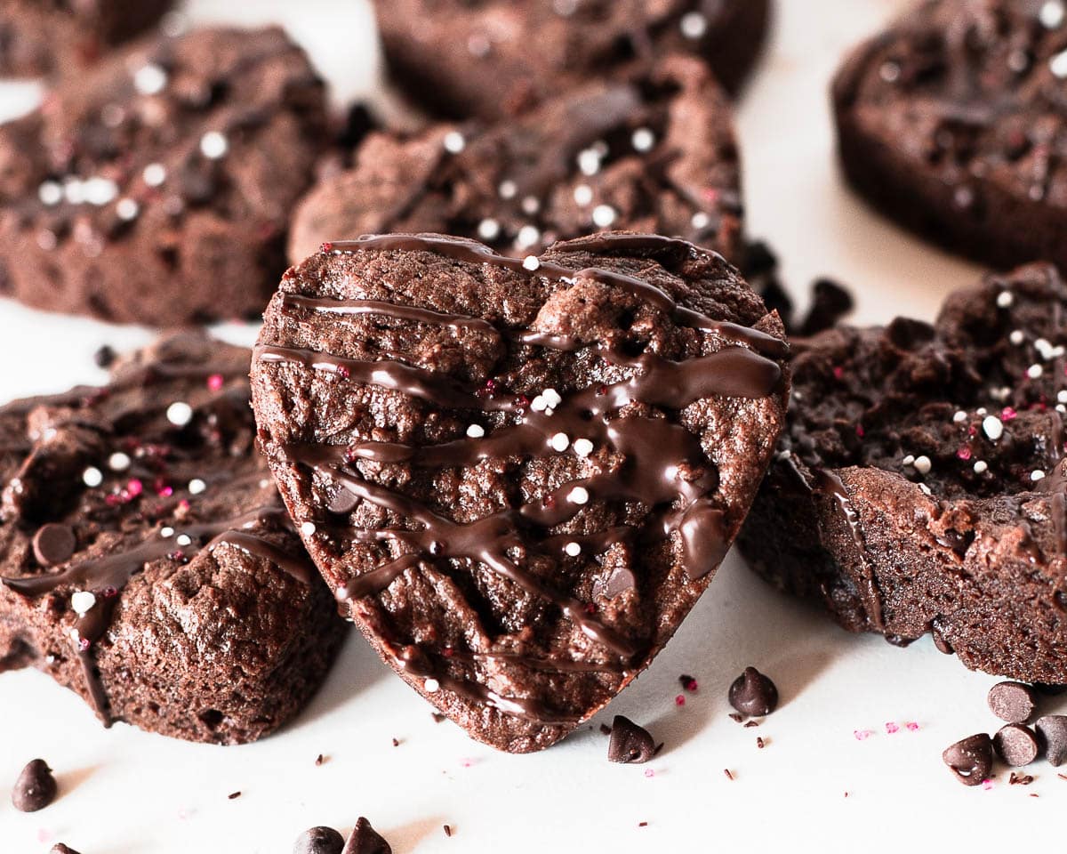 close-up of heart brownies with chocolate drizzle