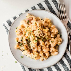 overhead shot of serving of tuna mac on a white plate.