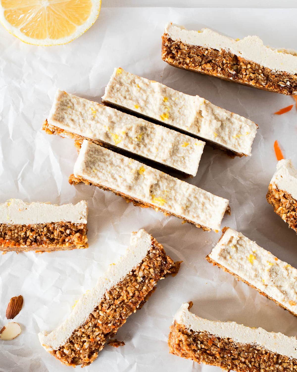 overhead shot of vegan carrot cake bars on parchment paper