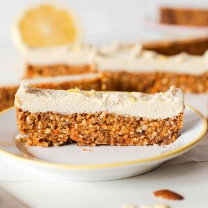 close-up of one of the freezer carrot cake bars on a plate