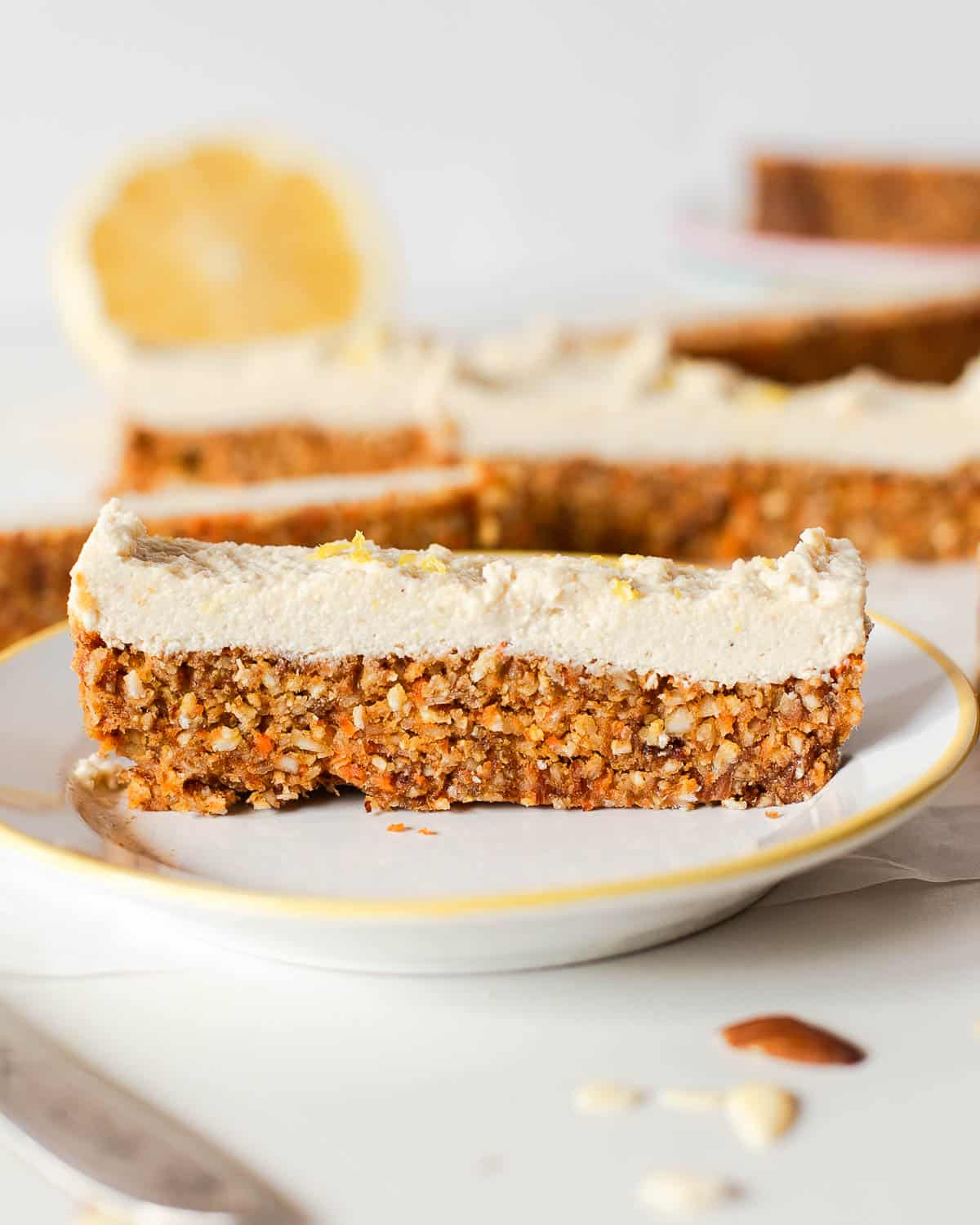 close-up of one of the freezer carrot cake bars on a plate