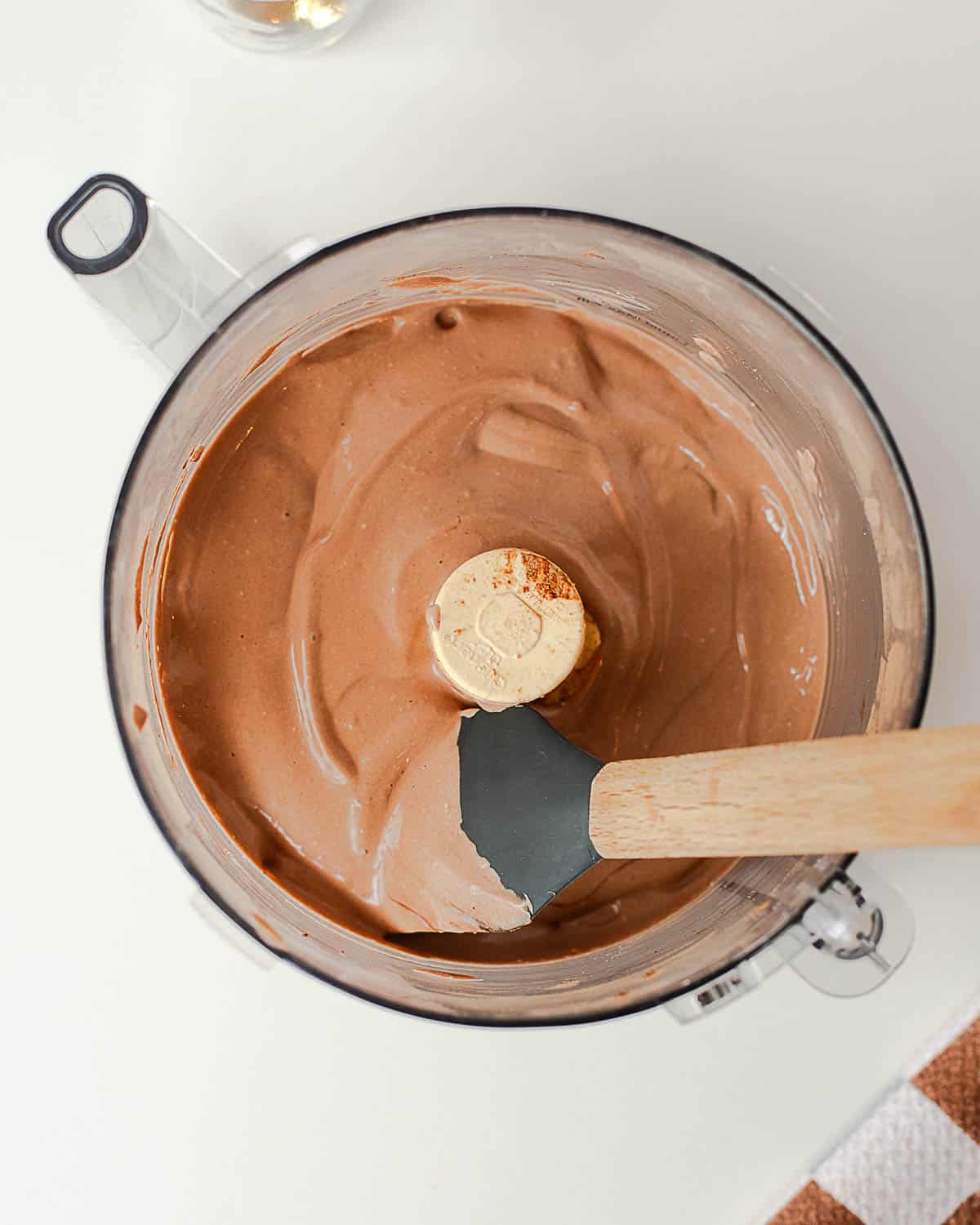 Creamy cottage cheese chocolate pudding blended smooth in a food processor with cocoa powder and chocolate protein powder.