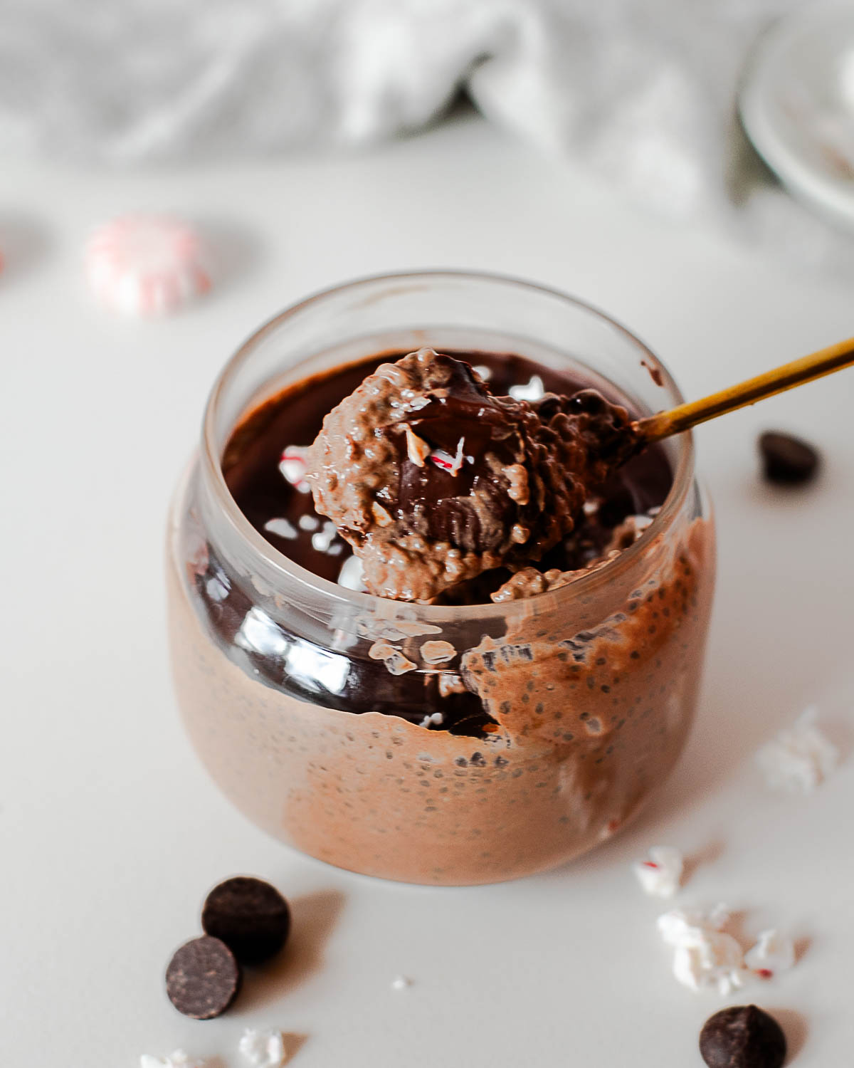 Close-up of chocolate peppermint chia pudding showing thick chia texture and chocolate shell
