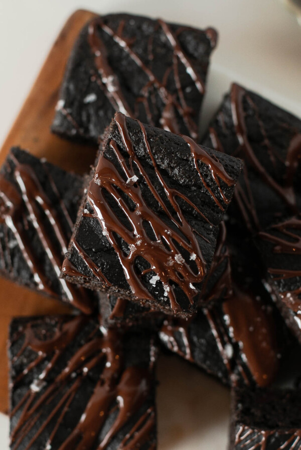 Close-up of a chocolate butternut squash brownie highlighting its soft, cake-like crumb.