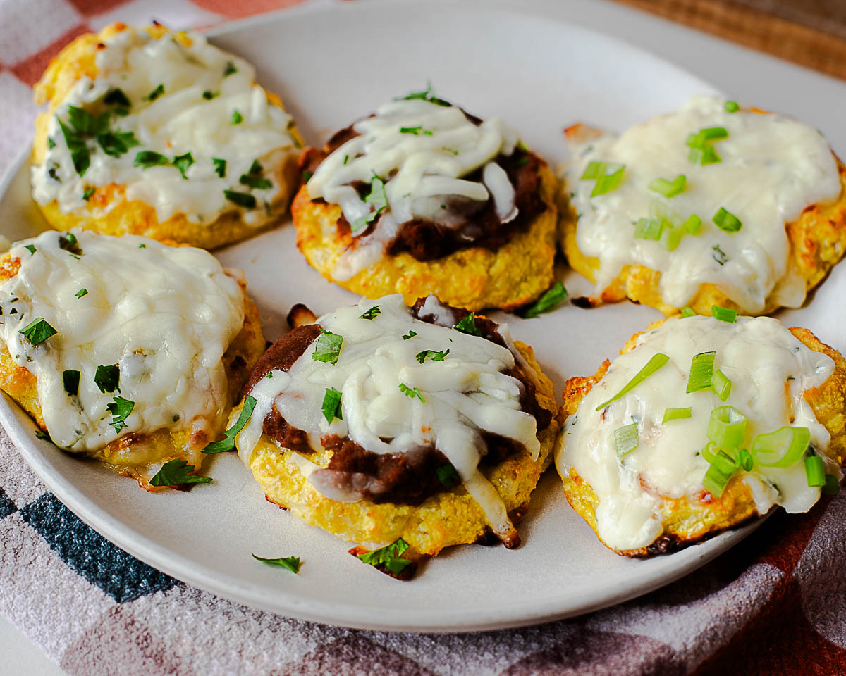 Cottage cheese pizza bites arranged on a plate, perfect for lunch or snacks
