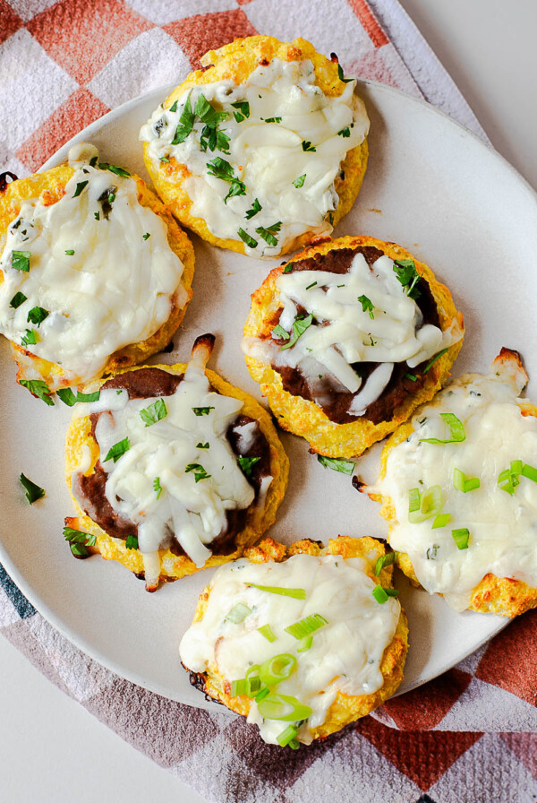 Close-up of cottage cheese pizza bites with melted cheese and pizza-style toppings