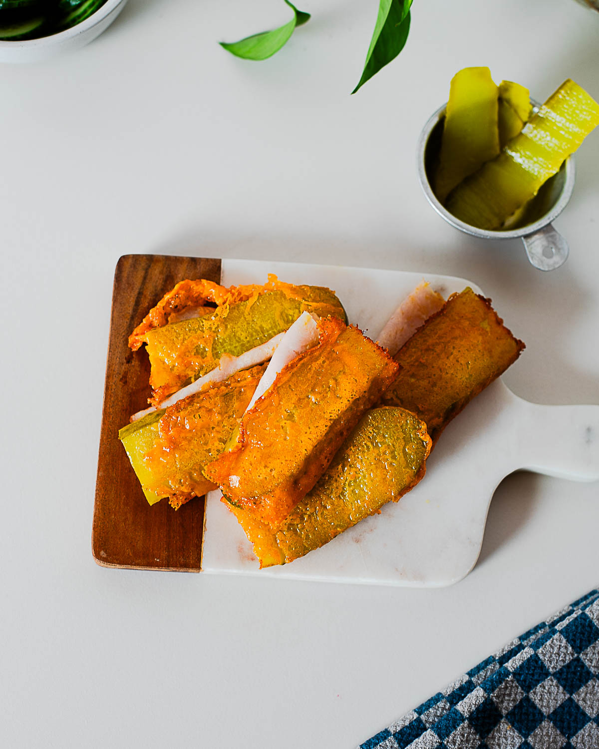 High-protein chickles made with melted cheddar cheese, turkey, and dill pickles ready to eat