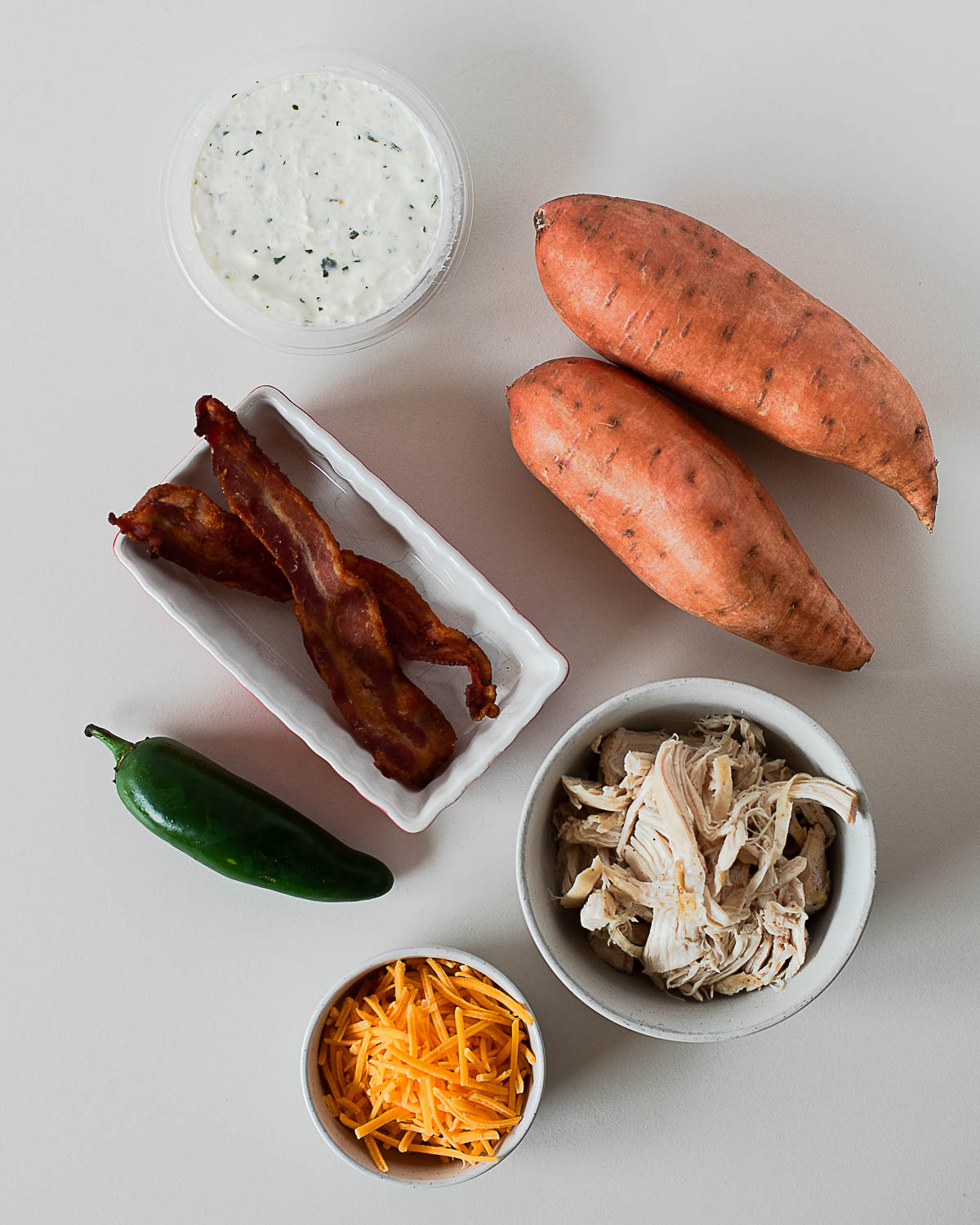 Ingredient shot for jalapeño popper sweet potatoes with chicken and bacon