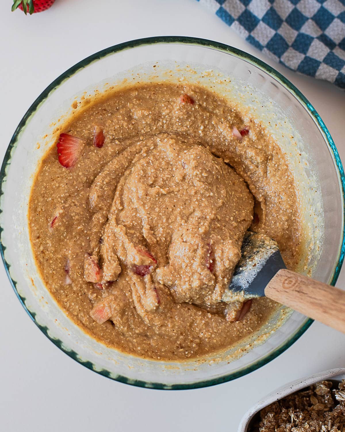 Strawberry coffee cake batter fully mixed with fresh strawberries folded in