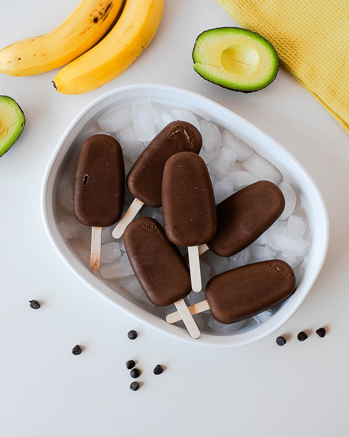 Creamy chocolate avocado popsicles with simple wholesome ingredients.